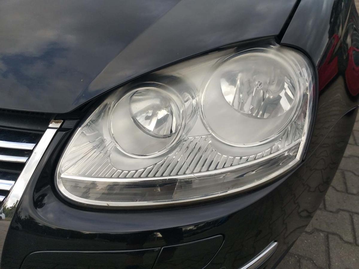VW Jetta 1K2 original Scheinwerfer vorn links Halogen leicht vergilbt Bj.2009